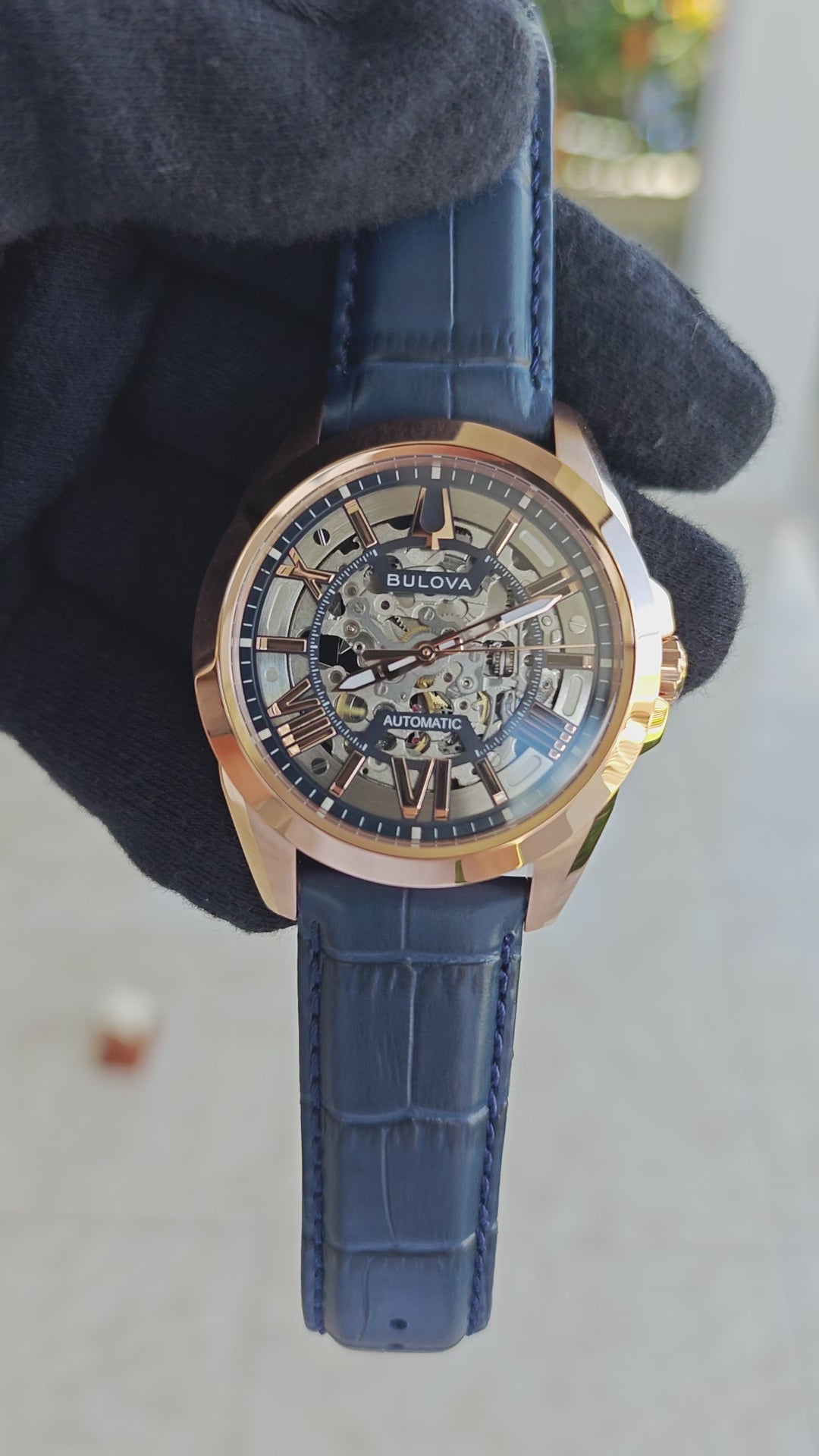 Bulova Sutton 97A161 – Automatic Skeleton Rose Gold & Blue